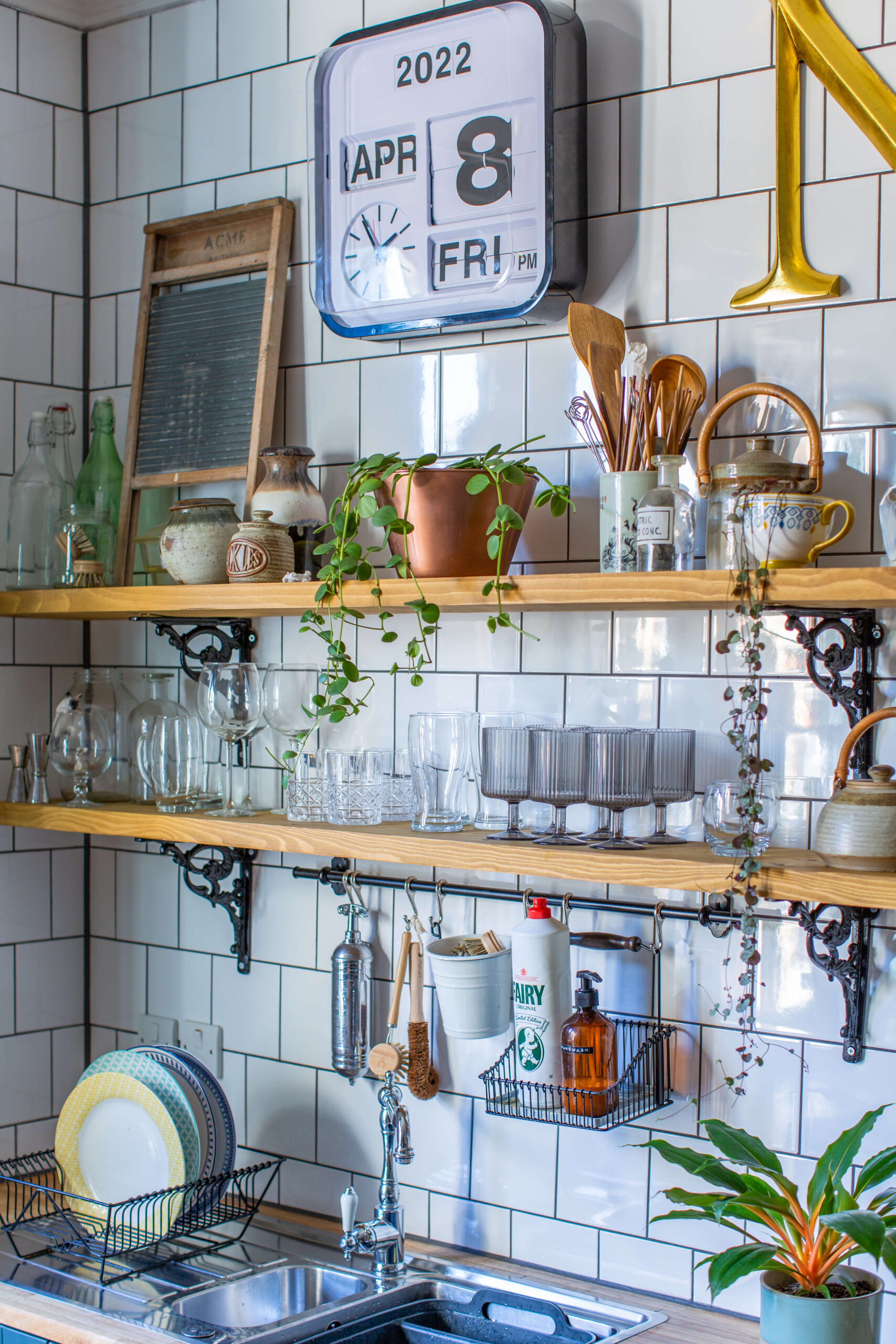 Scaffold board shelves are a low cost alternative to kitchen cabinets. © Tamsyn Morgans
